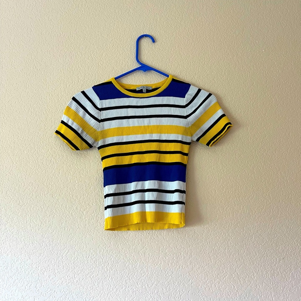 Size small, blue, black, yellow and white tee shirt